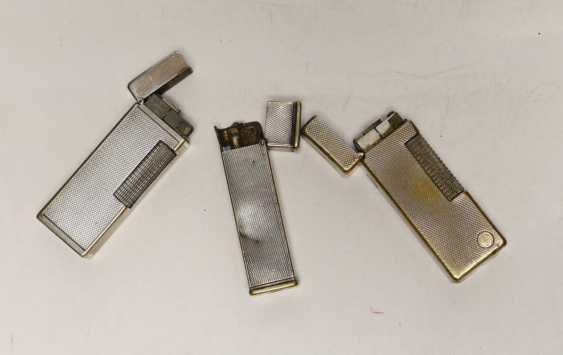 Three assorted Dunhill lighters